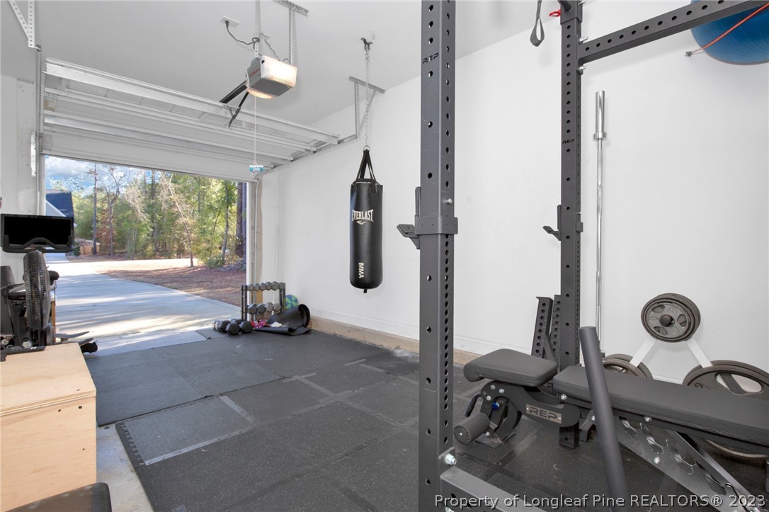 101 Carousel Street West End, NC 27376 - Photo 34 of 50 a view of gym equipment and windows