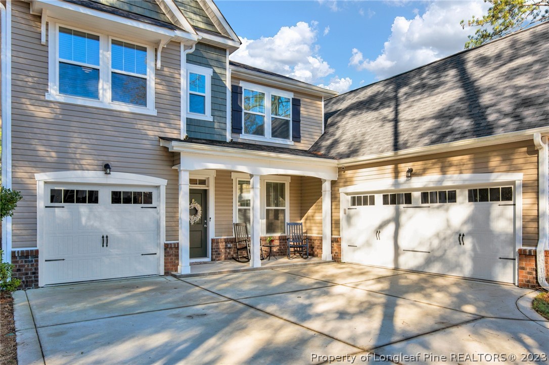 101 Carousel Street West End, NC 27376 - Photo 4 of 50 a view of a building with a outdoor space