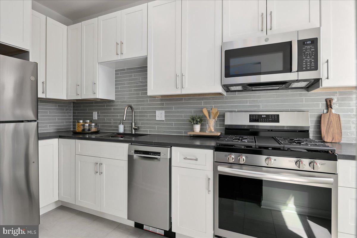 1831 Belmont Road Northwest, Unit 405 Washington, DC 20009 - Photo 3 of 29 Exquisite Kitchen