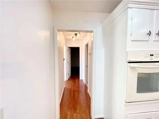 a view of a hallway with entryway