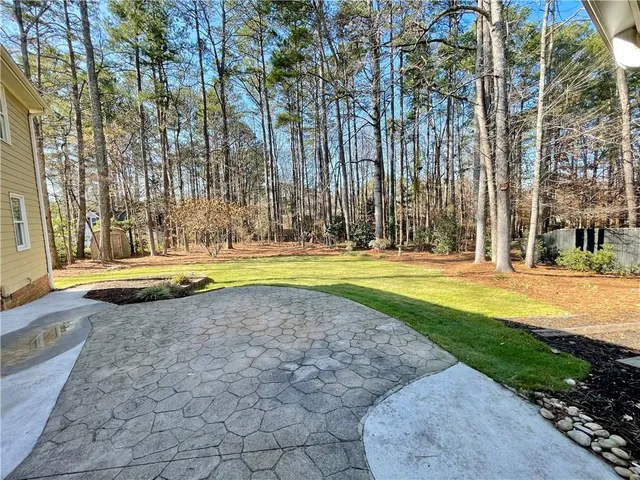 a view of a swimming pool with an outdoor space