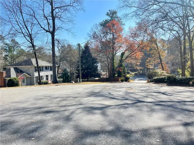 a view of road with trees