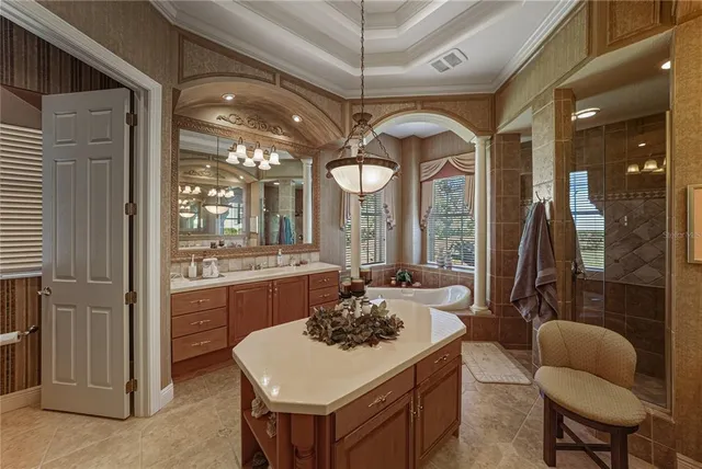 an aerial view of a residential houses with outdoor space and street view