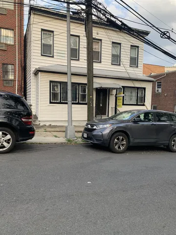 a car parked in front of a building