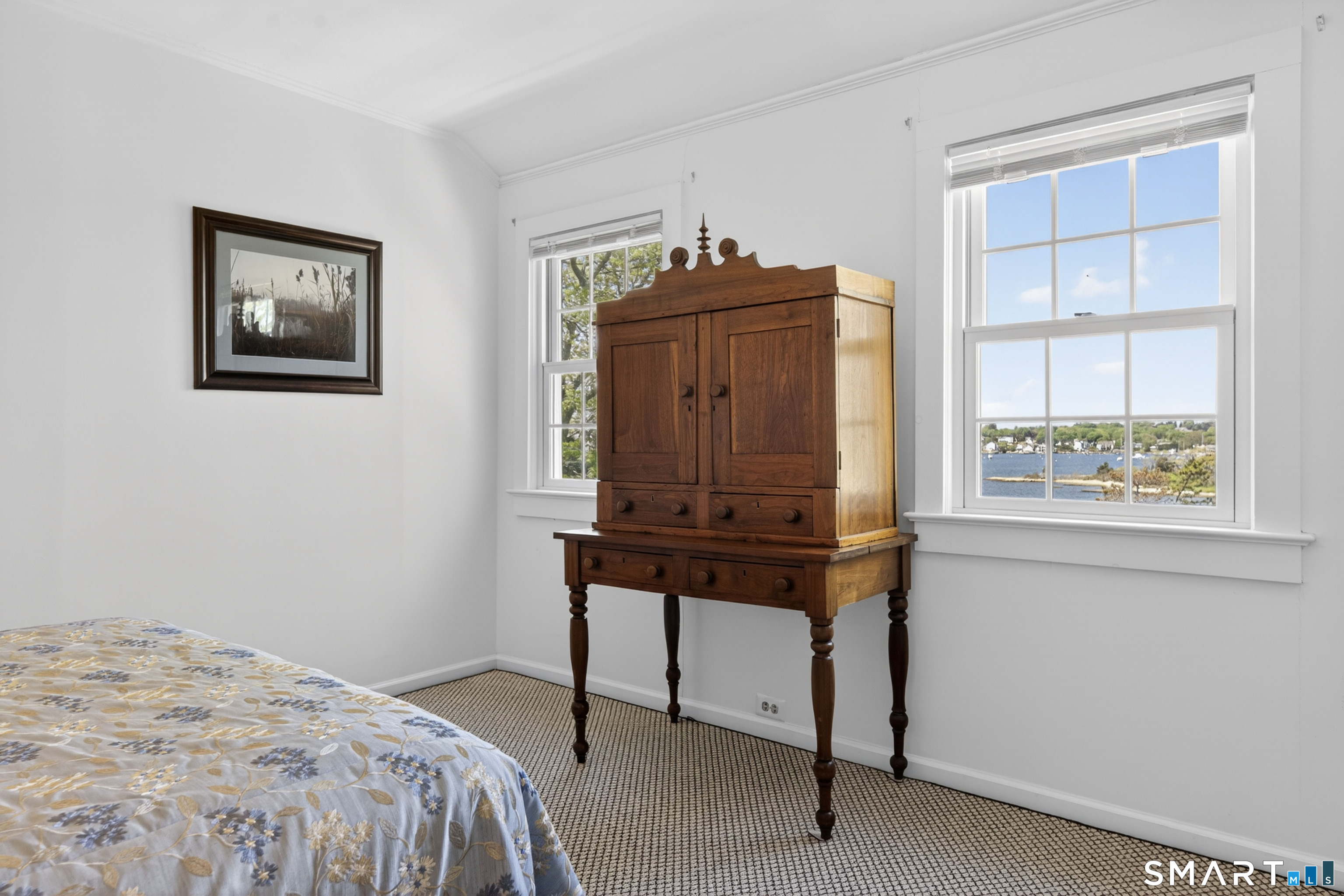 32 Money Point Road Stonington, CT 06355 - Photo 29 of 40 a bedroom with a bed and a window