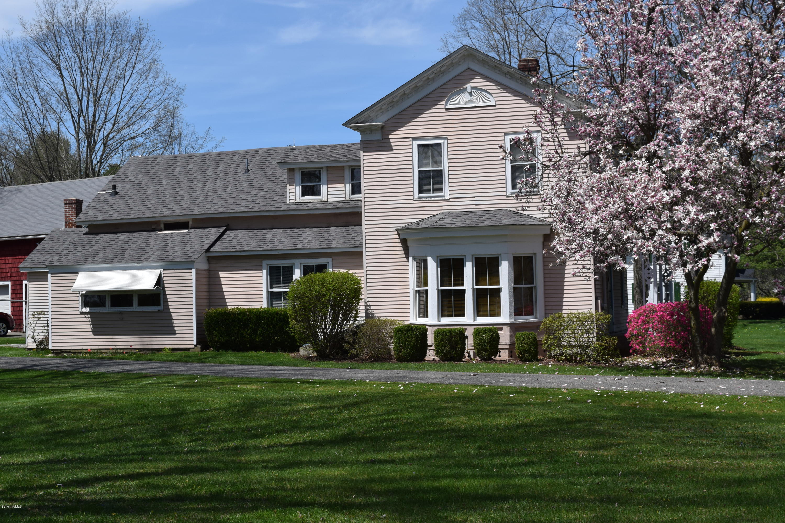 1114 Ashley Falls Road Sheffield, MA 01222 - Photo 1 of 53 a front view of a house with a yard