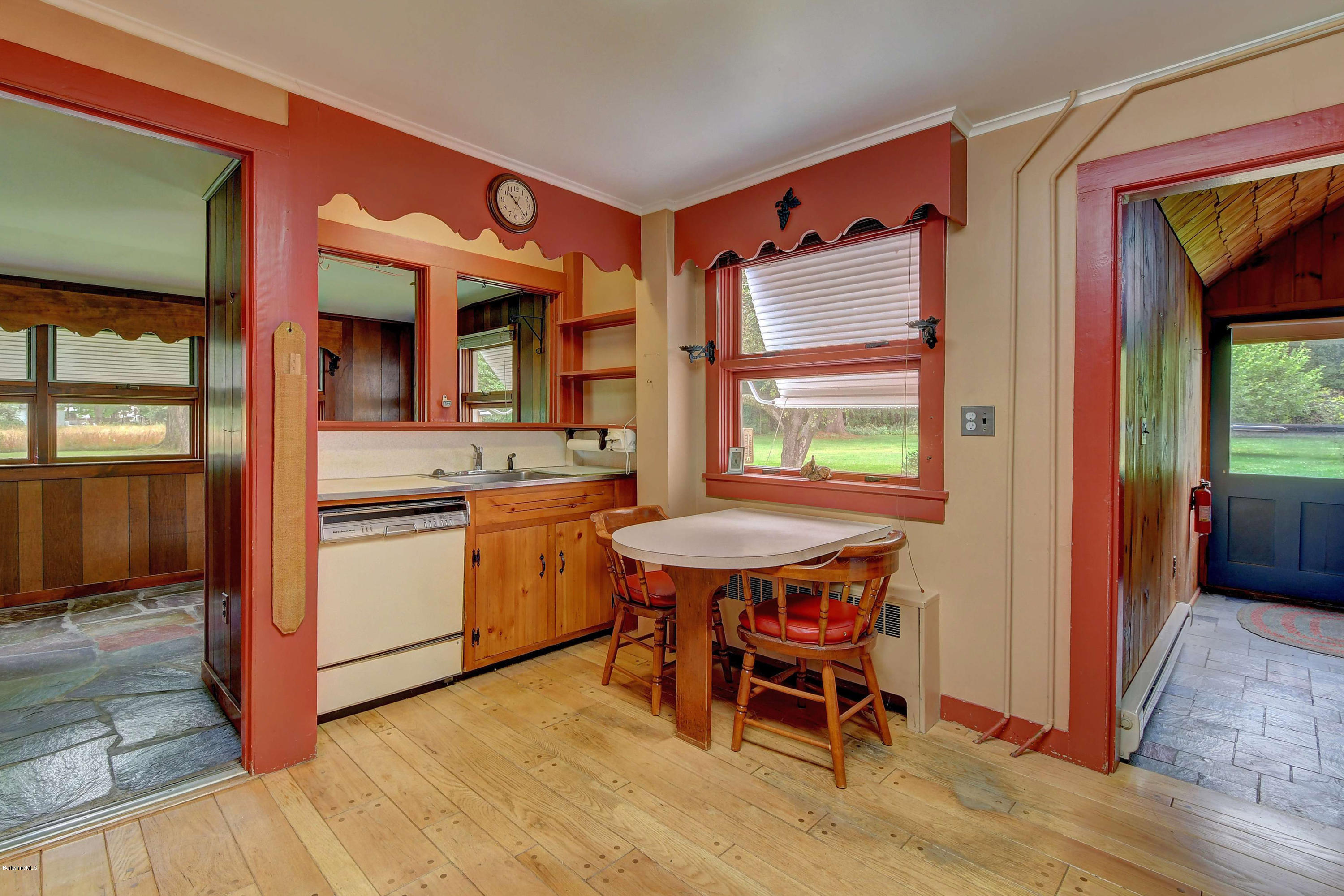 1114 Ashley Falls Road Sheffield, MA 01222 - Photo 13 of 53 a kitchen that has a stove and a table