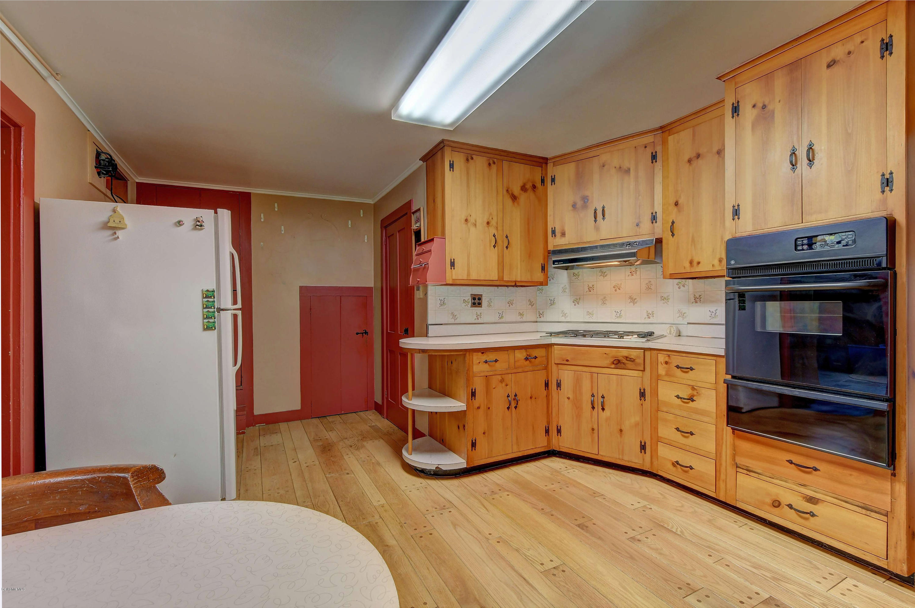 1114 Ashley Falls Road Sheffield, MA 01222 - Photo 14 of 53 a kitchen with stainless steel appliances granite countertop a refrigerator a stove a sink and dishwasher