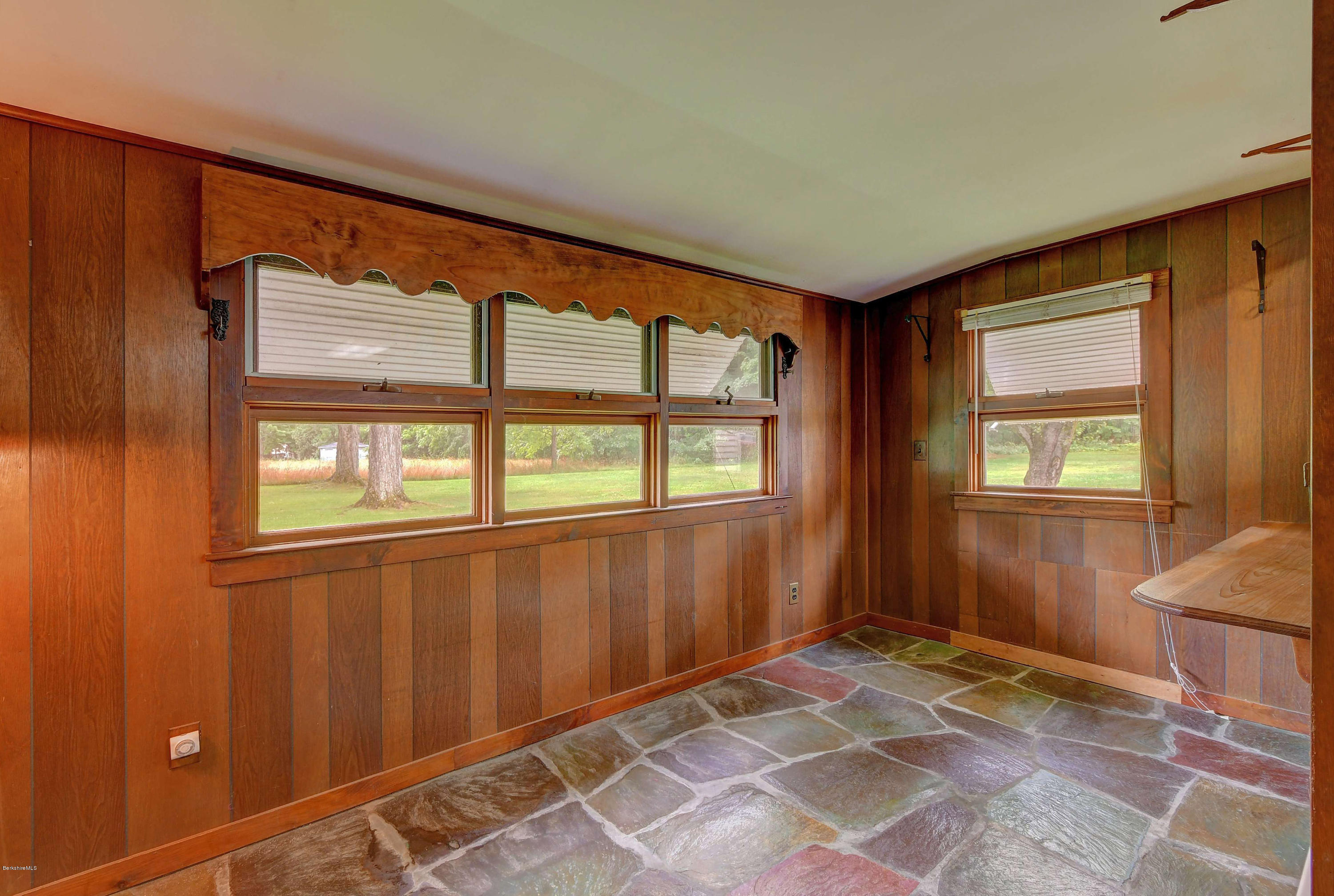 1114 Ashley Falls Road Sheffield, MA 01222 - Photo 15 of 53 a view of an empty room with a window