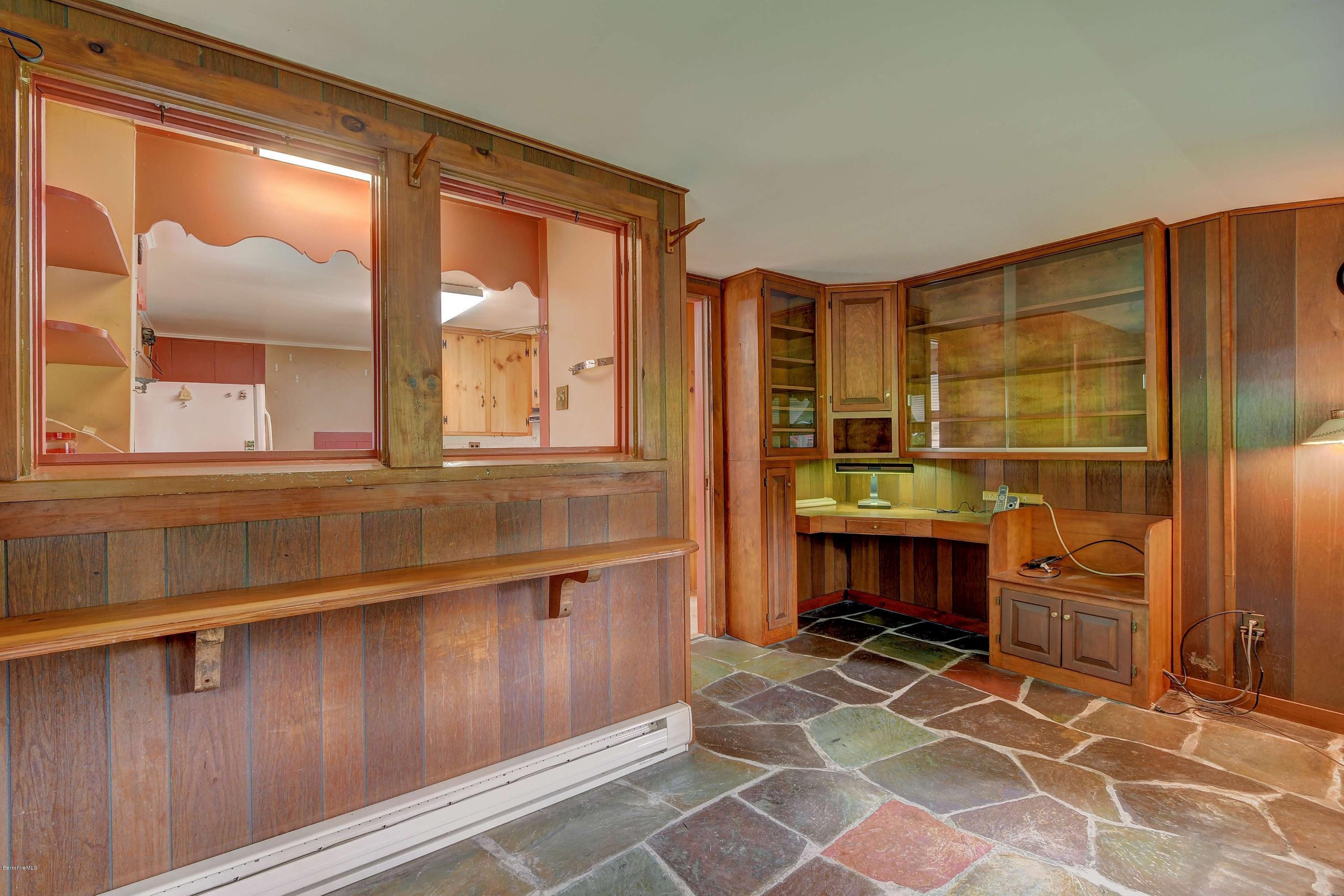 1114 Ashley Falls Road Sheffield, MA 01222 - Photo 16 of 53 a room with table and windows