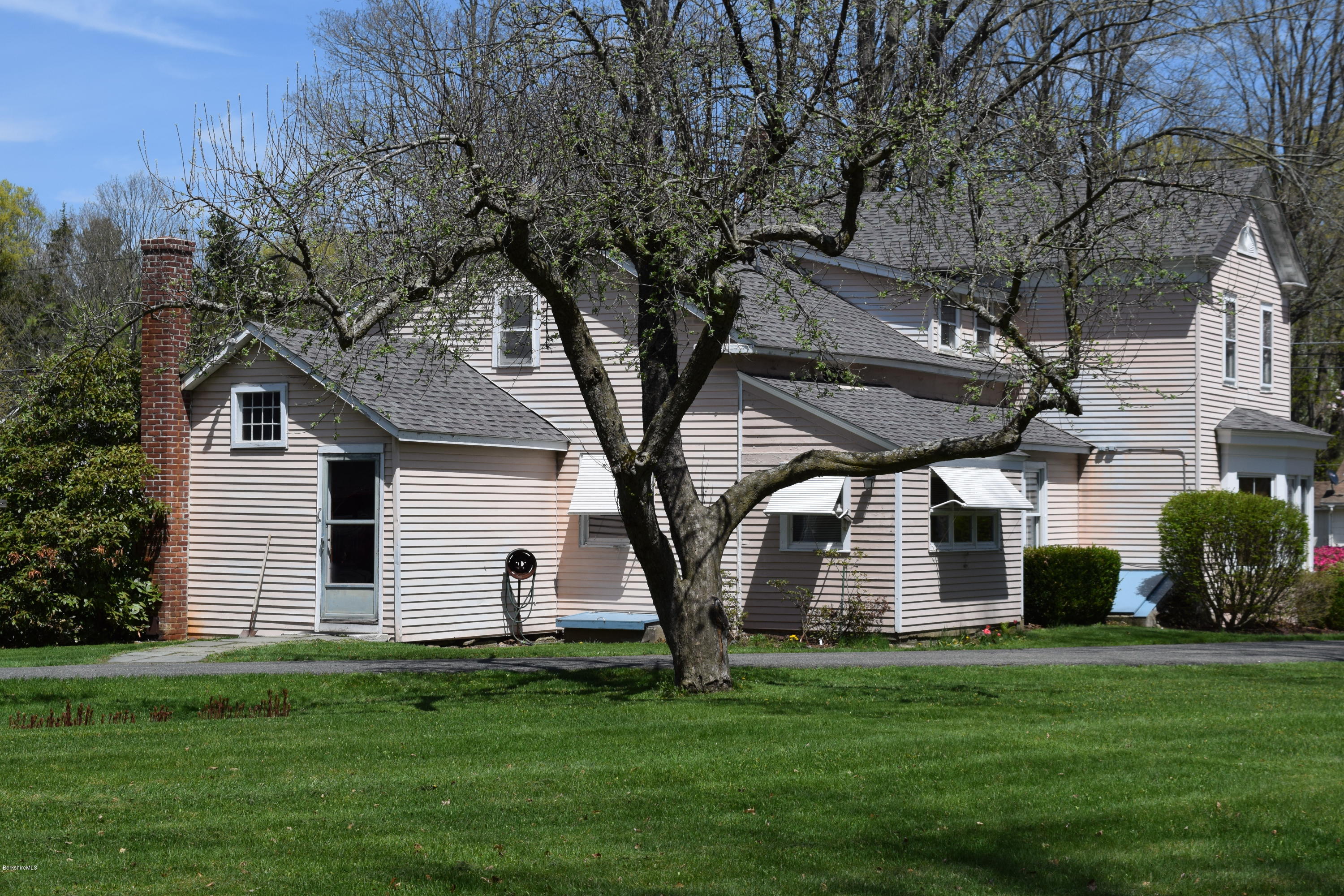 1114 Ashley Falls Road Sheffield, MA 01222 - Photo 3 of 53 a front view of a house with a garden