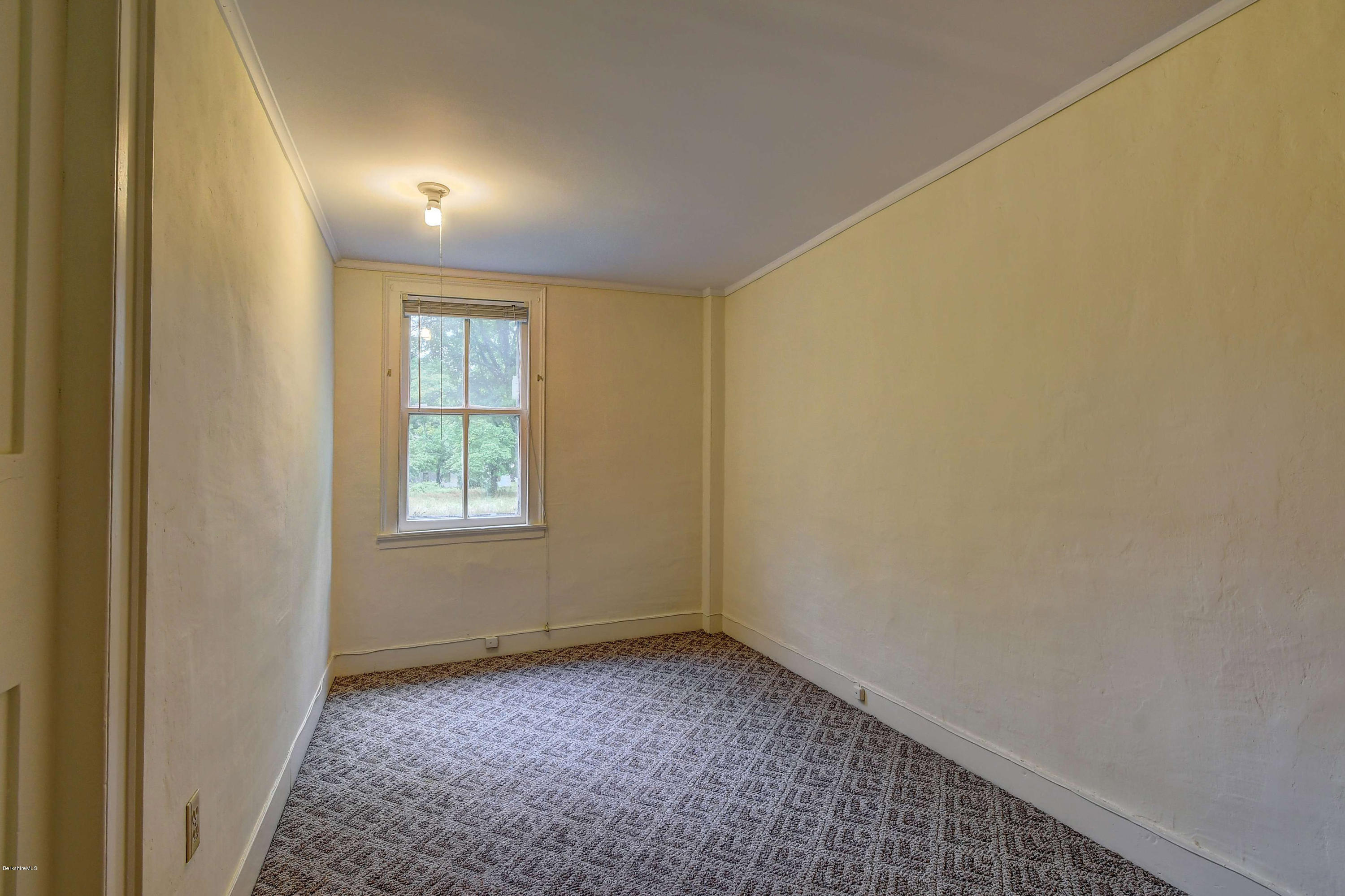 1114 Ashley Falls Road Sheffield, MA 01222 - Photo 33 of 53 an empty room with a empty space and windows