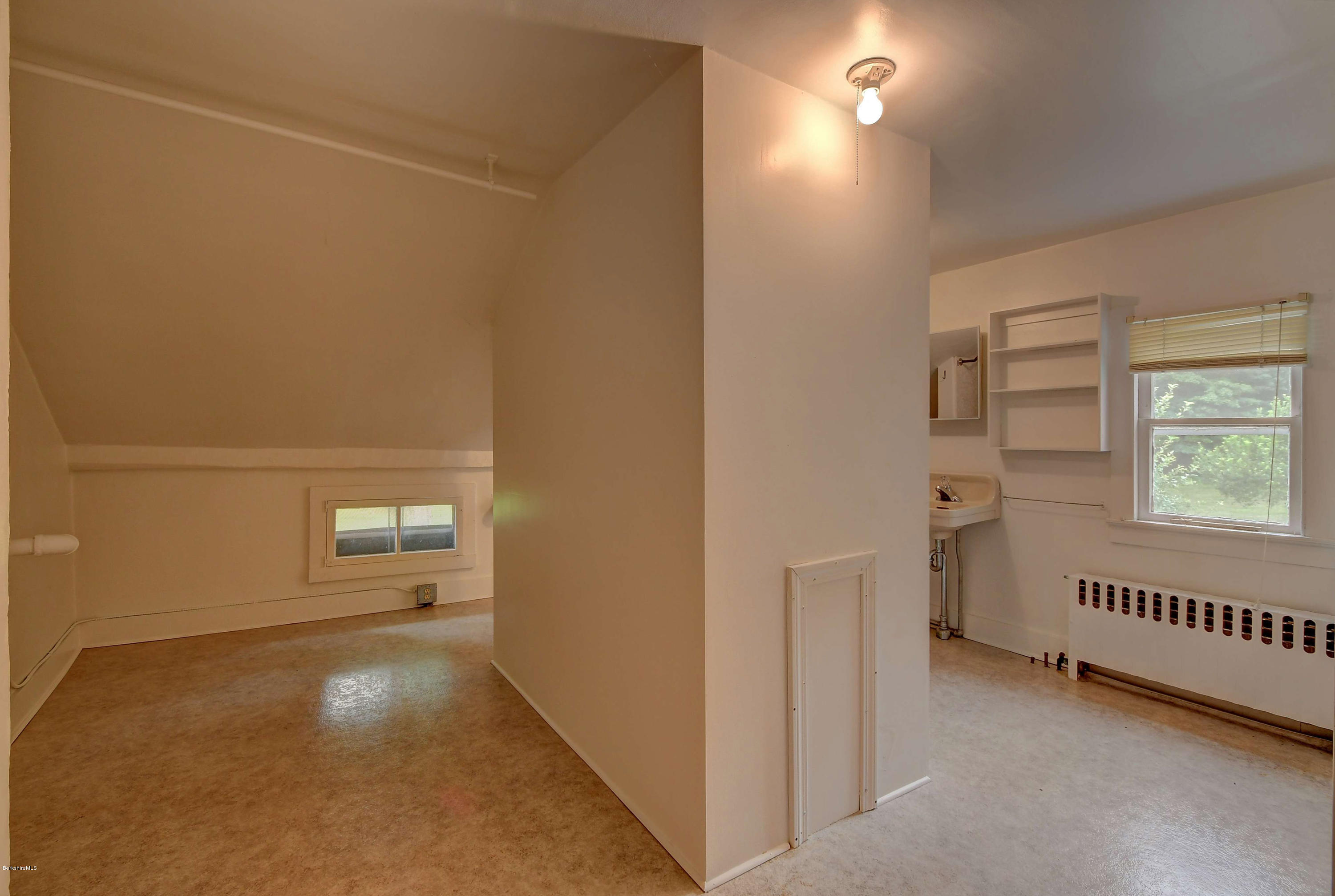 1114 Ashley Falls Road Sheffield, MA 01222 - Photo 35 of 53 an empty room with windows