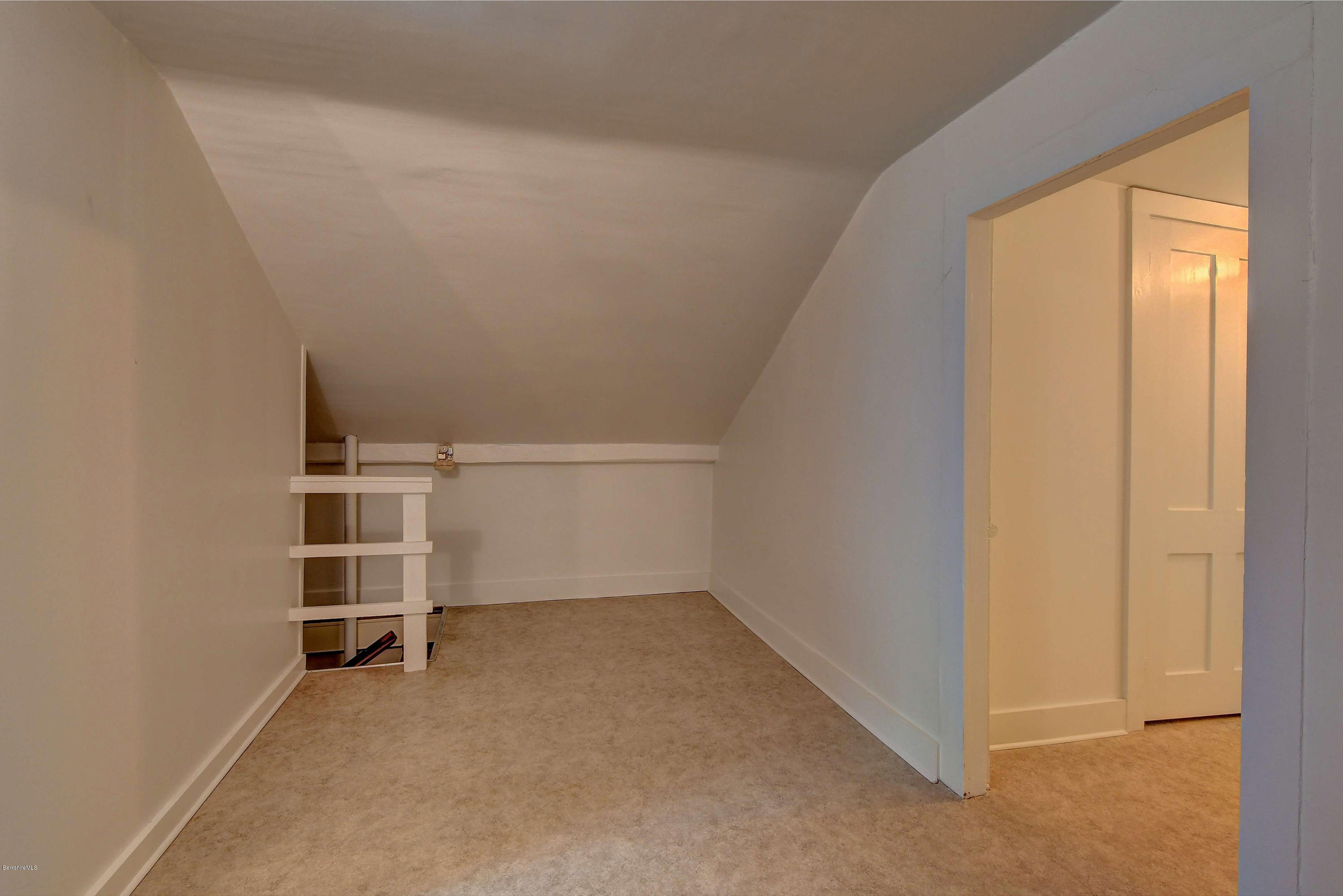 1114 Ashley Falls Road Sheffield, MA 01222 - Photo 37 of 53 an empty room with a empty shelves