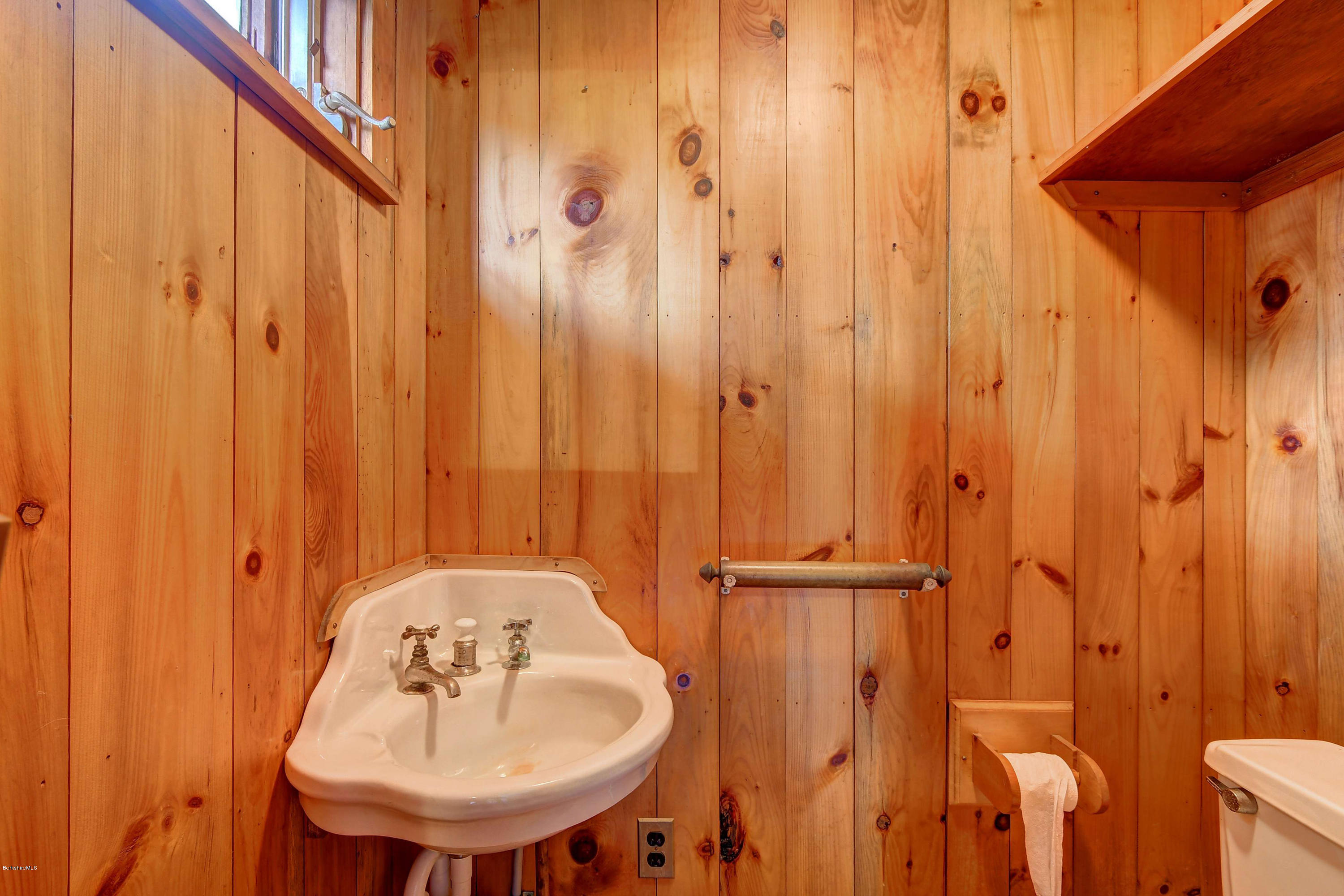 1114 Ashley Falls Road Sheffield, MA 01222 - Photo 44 of 53 a bathroom with a sink and mirror