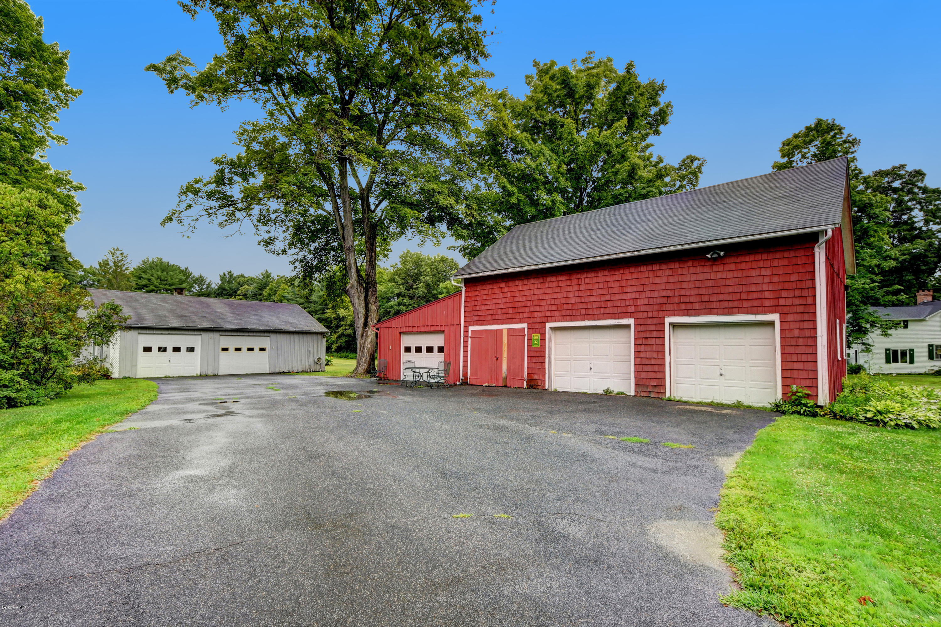 1114 Ashley Falls Road Sheffield, MA 01222 - Photo 45 of 53 a view of a house with a yard and garage