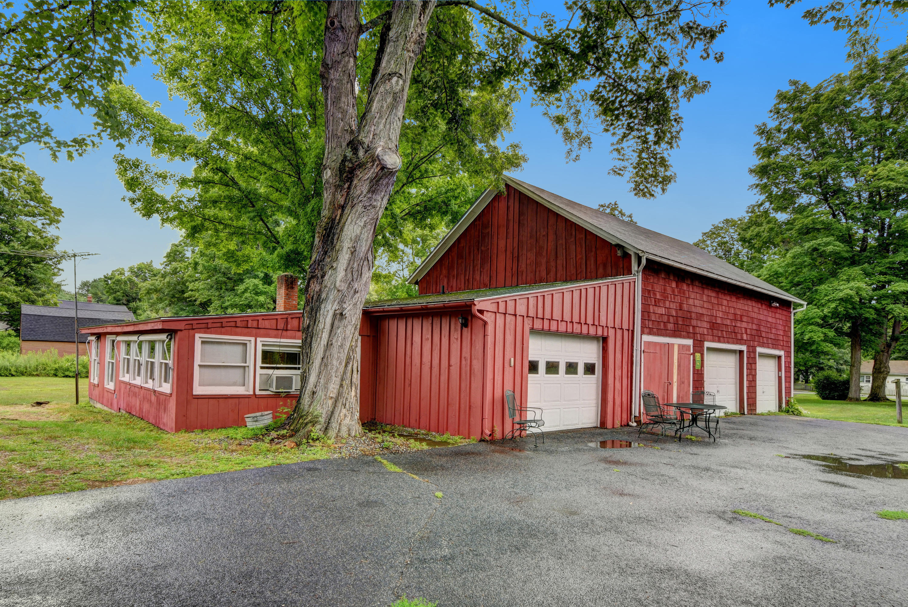 1114 Ashley Falls Road Sheffield, MA 01222 - Photo 47 of 53 a view of a house with a yard and garage