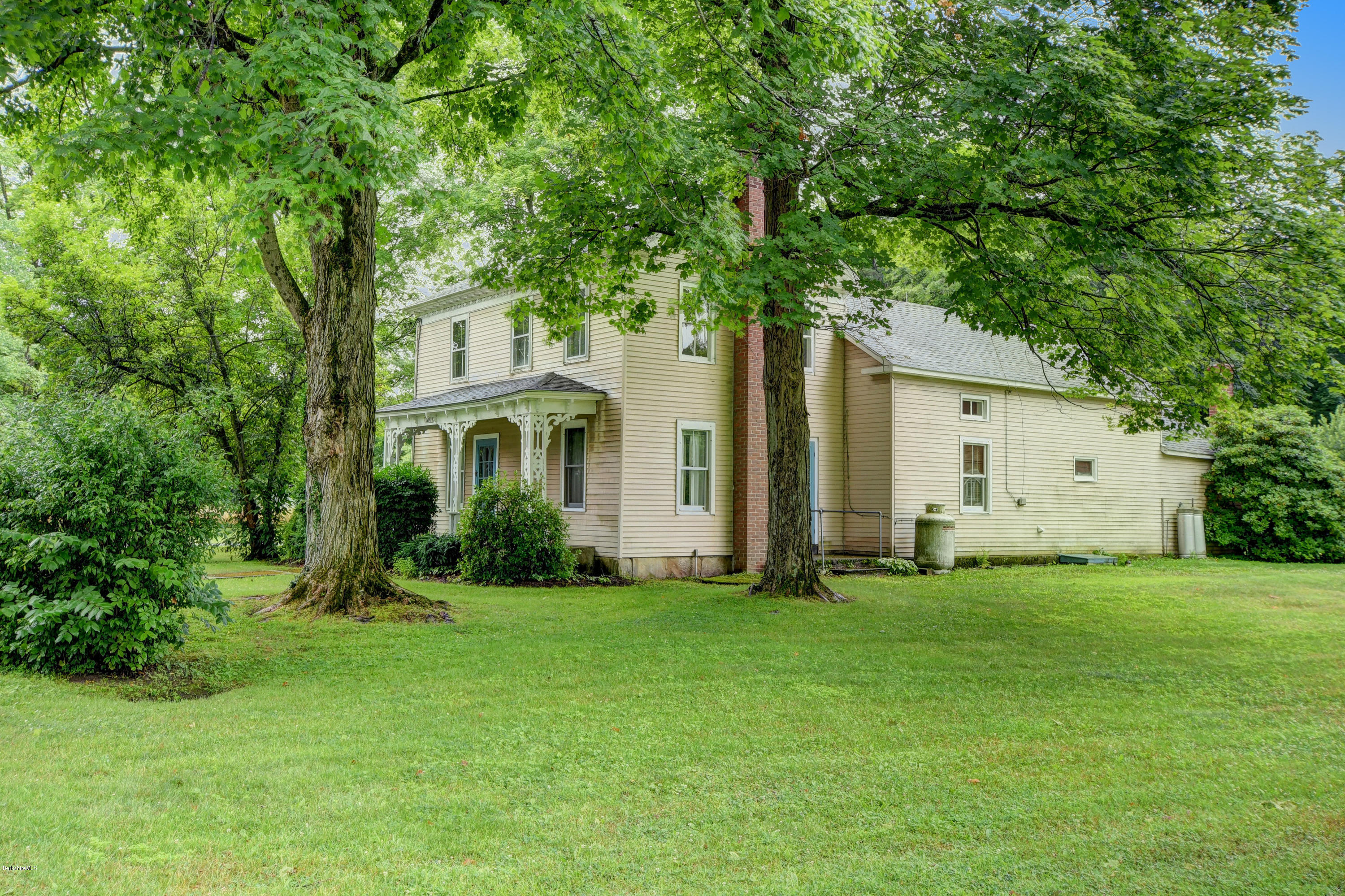 1114 Ashley Falls Road Sheffield, MA 01222 - Photo 6 of 53 a front view of a house with a yard
