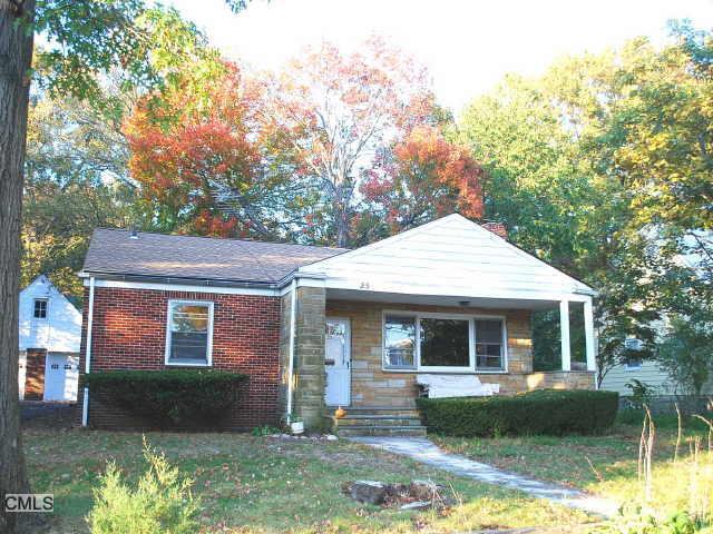 23 Hirsch Road Stamford, CT 06905 - Photo 1 of 1 a front view of a house with garden