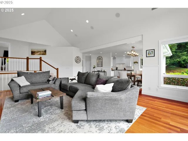 a living room with furniture and a rug