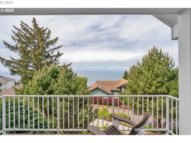 a view of balcony with small garden