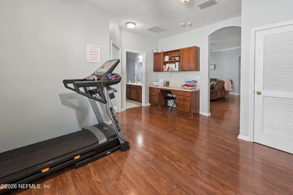 a view of a room with gym equipment