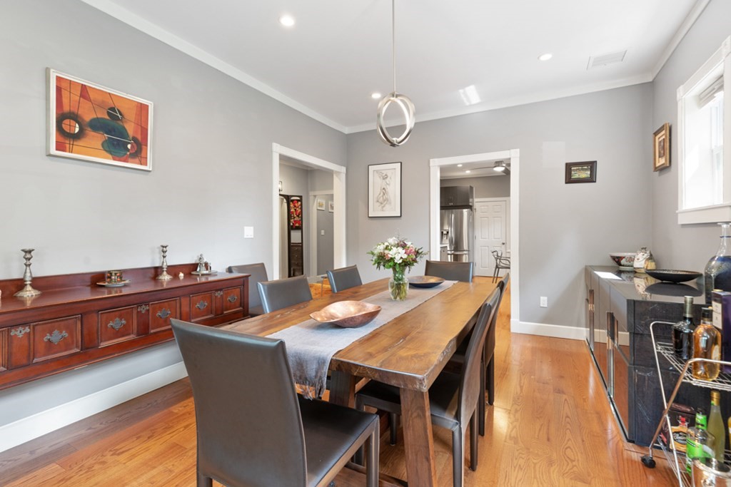 102 Addington Road, Unit 2 Brookline, MA 02445 - Photo 13 of 30 a view of a dining room with furniture window and wooden floor