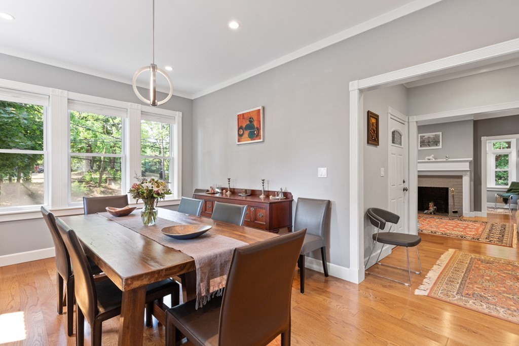 102 Addington Road, Unit 2 Brookline, MA 02445 - Photo 14 of 30 a view of a dining room with furniture window and wooden floor
