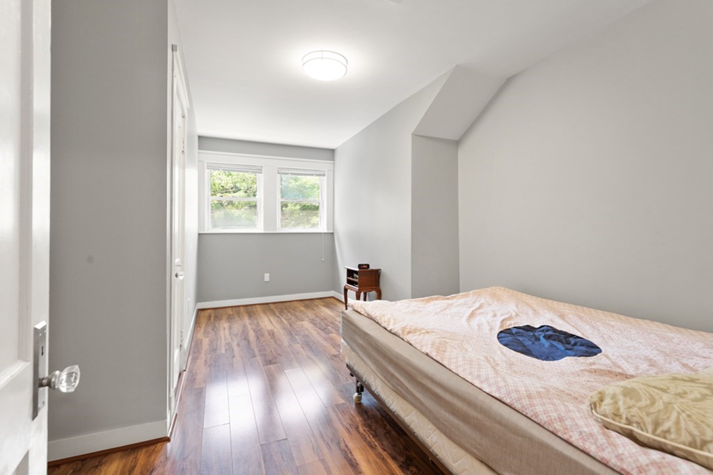 102 Addington Road, Unit 2 Brookline, MA 02445 - Photo 21 of 30 a bedroom with a bed and a window