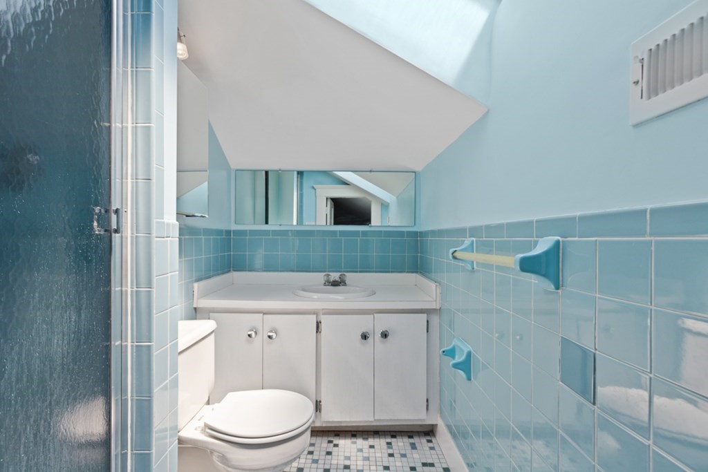 102 Addington Road, Unit 2 Brookline, MA 02445 - Photo 28 of 30 a bathroom with a sink a toilet and shower