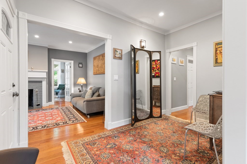 102 Addington Road, Unit 2 Brookline, MA 02445 - Photo 4 of 30 a living room with furniture and a rug