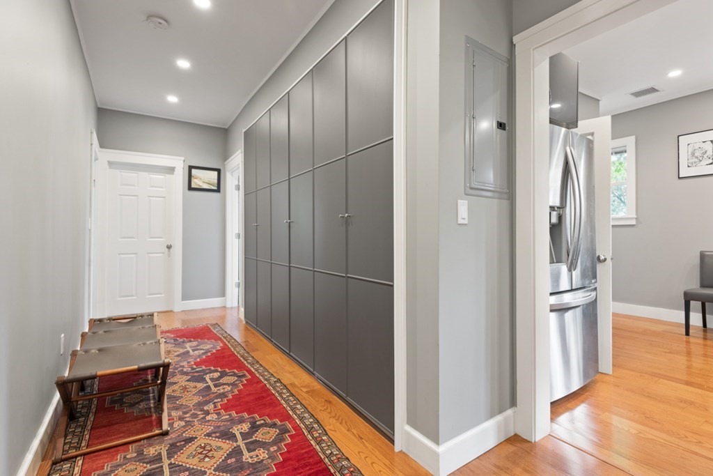 102 Addington Road, Unit 2 Brookline, MA 02445 - Photo 6 of 30 a very nice looking hallway with a carpet