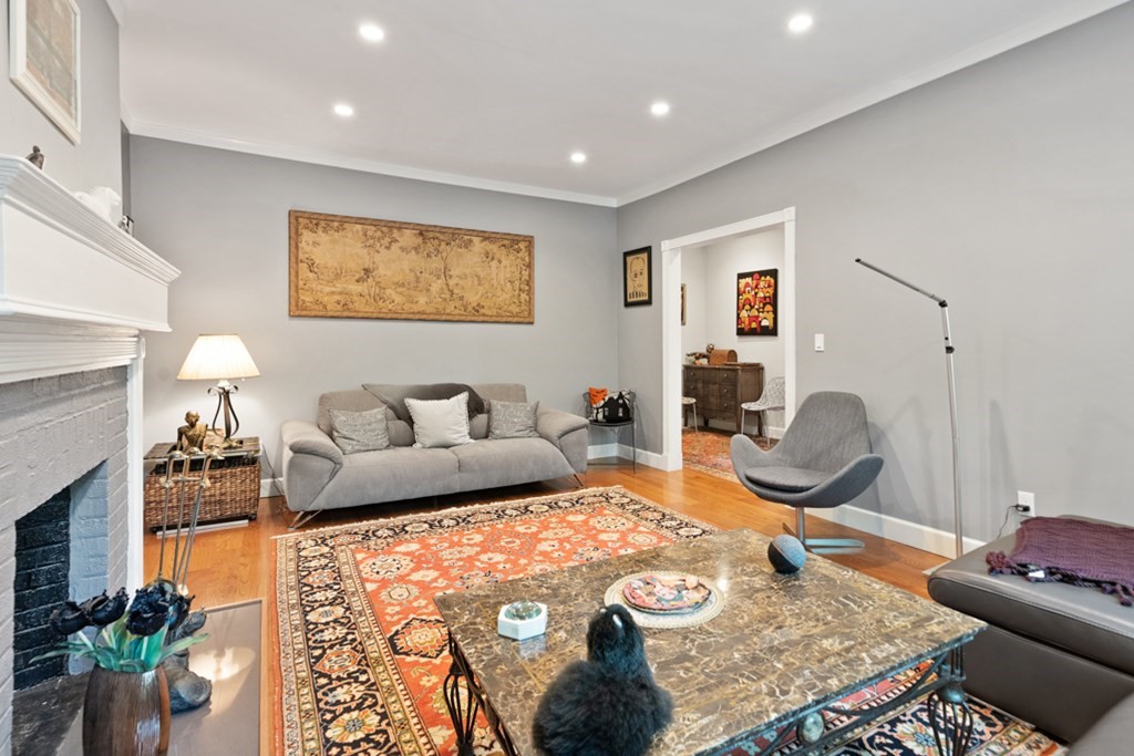 102 Addington Road, Unit 2 Brookline, MA 02445 - Photo 9 of 30 a living room with furniture and a rug
