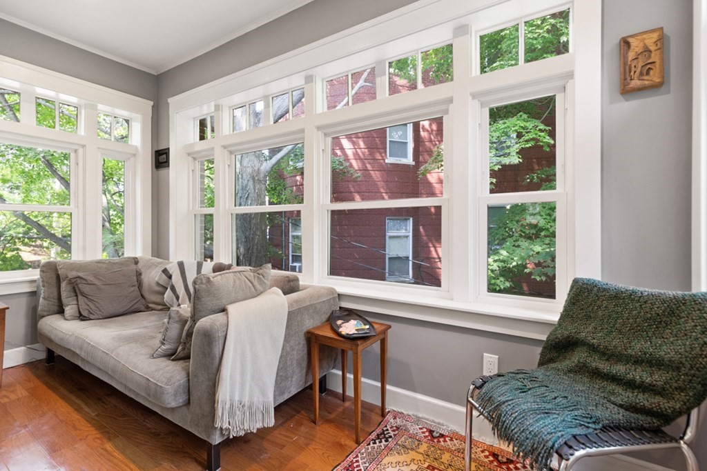 102 Addington Road, Unit 2 Brookline, MA 02445 - Photo 10 of 30 a living room with furniture and a large window