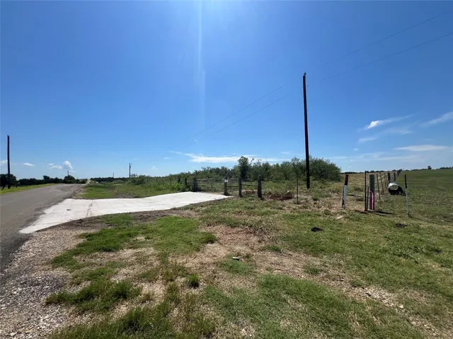 a view of a garden with a lake