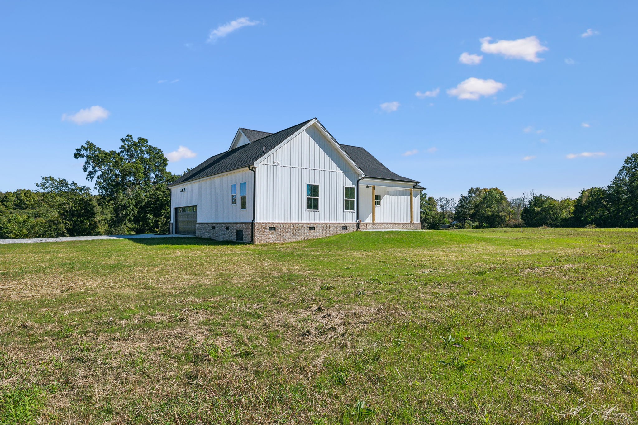 83 Loss Crouch Road Morrison, TN 37357 - Photo 34 of 37 a view of a house with a backyard