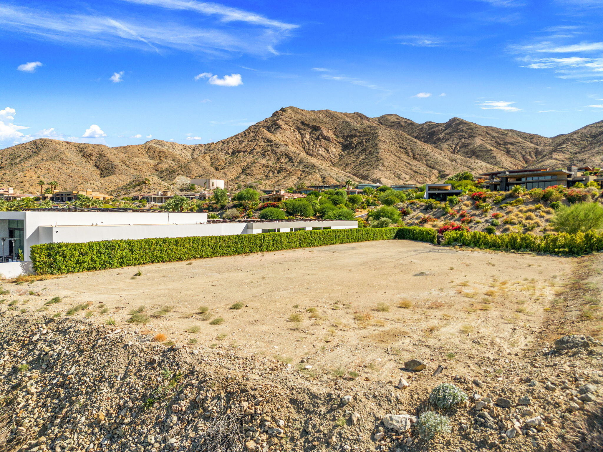 33 Granite Ridge Road Rancho Mirage, CA 92270 - Photo 16 of 29 a view of an lake and mountain