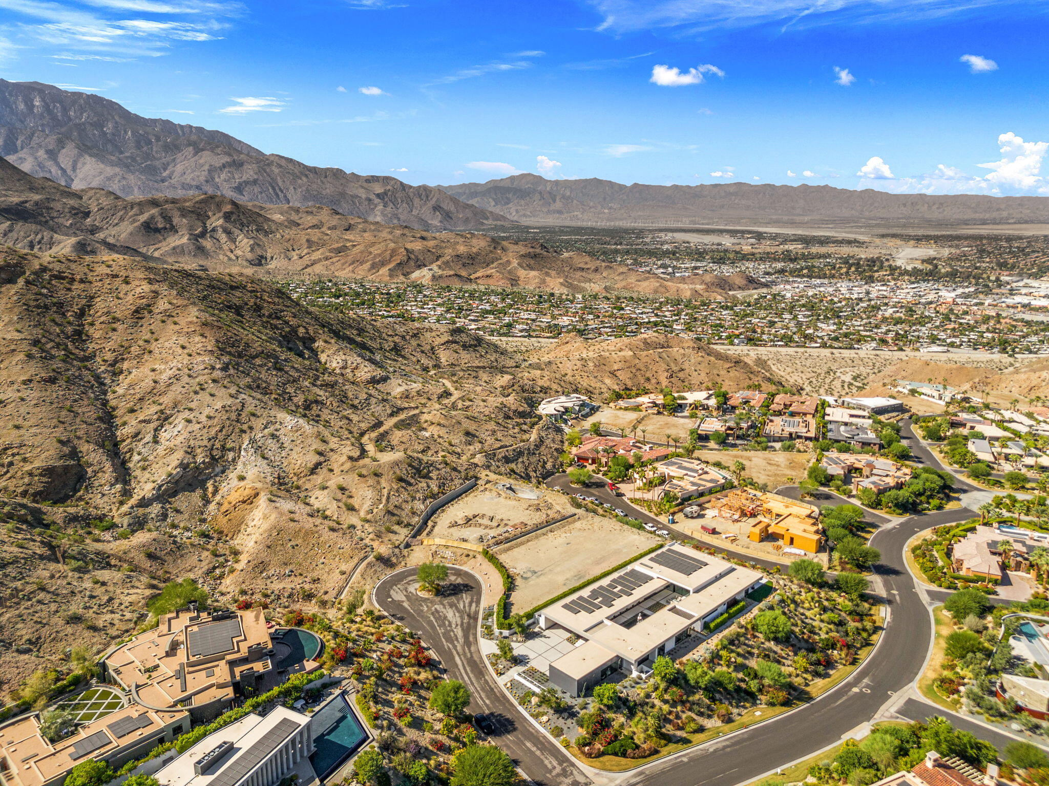 33 Granite Ridge Road Rancho Mirage, CA 92270 - Photo 24 of 29 an aerial view of residential houses with outdoor space