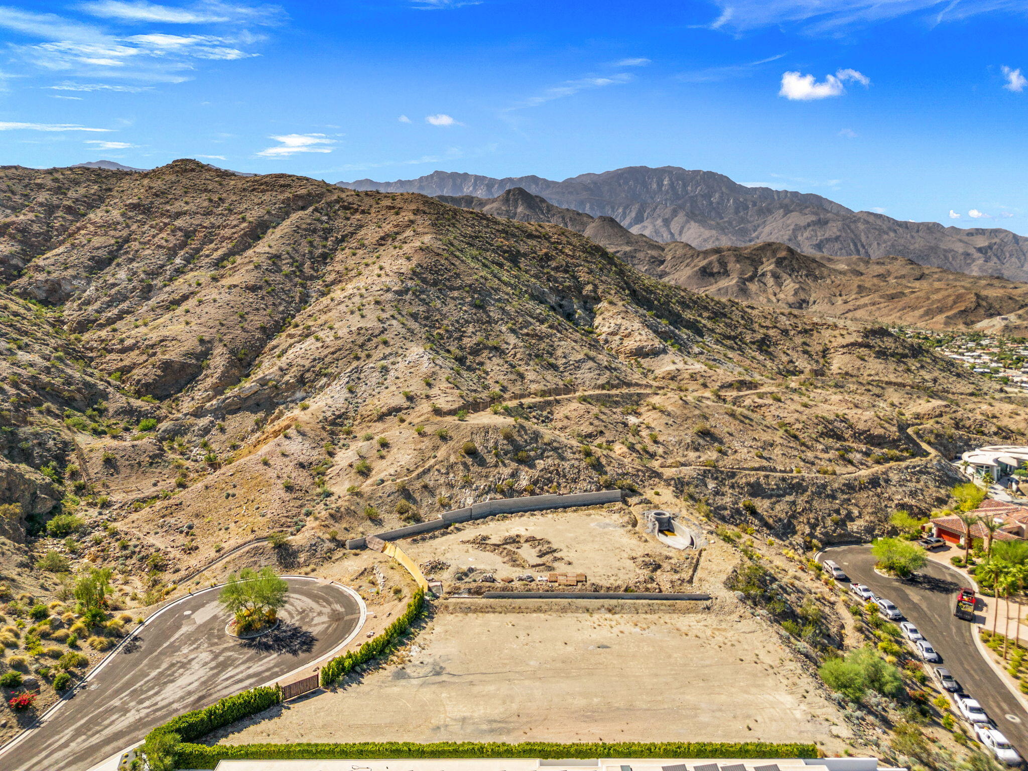 33 Granite Ridge Road Rancho Mirage, CA 92270 - Photo 27 of 29 a view of a yard with mountains in the background