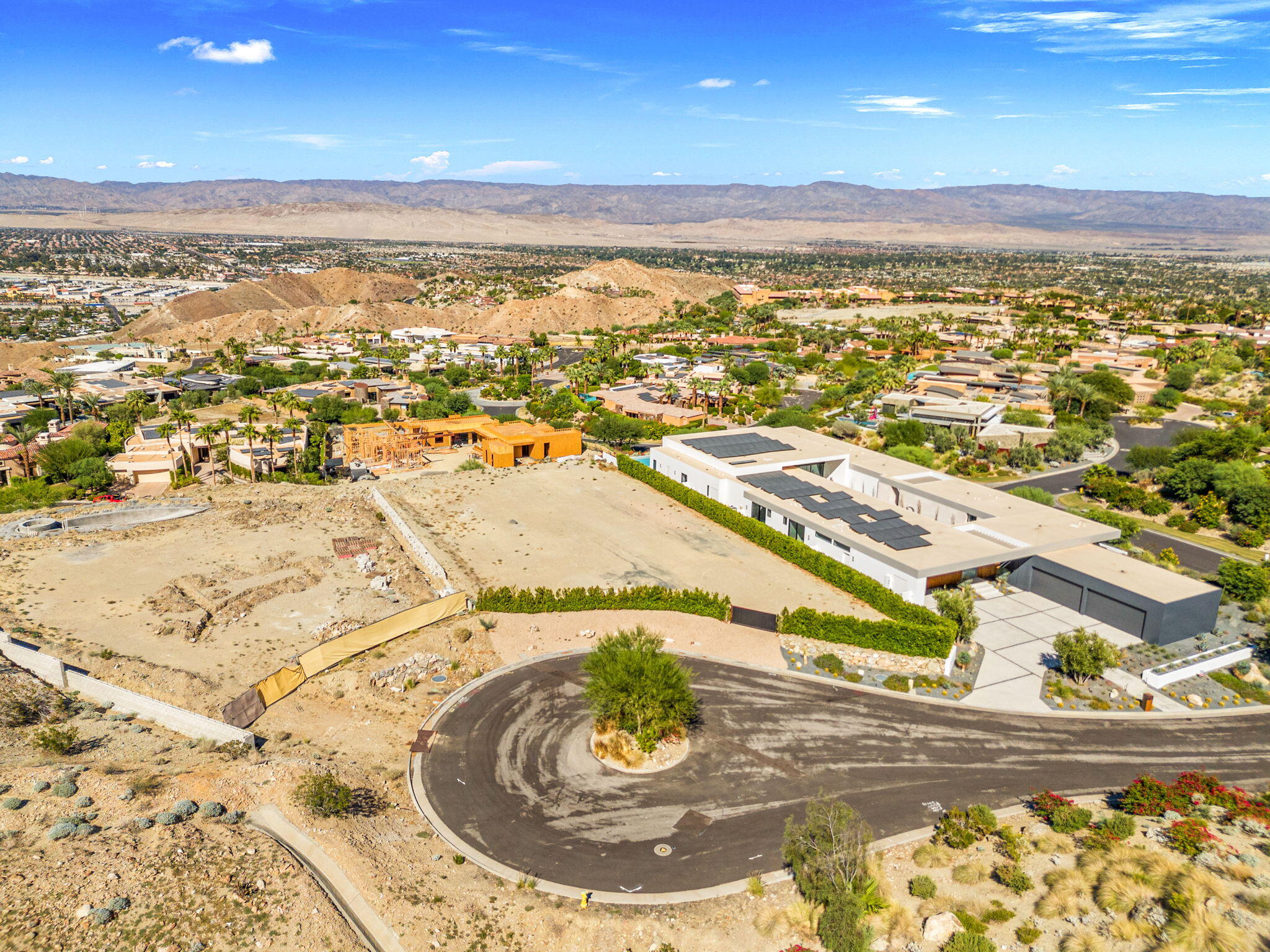 33 Granite Ridge Road Rancho Mirage, CA 92270 - Photo 6 of 29 an aerial view of residential houses with outdoor space