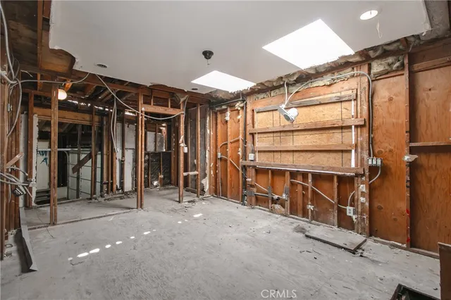 a view of a room with wooden walls