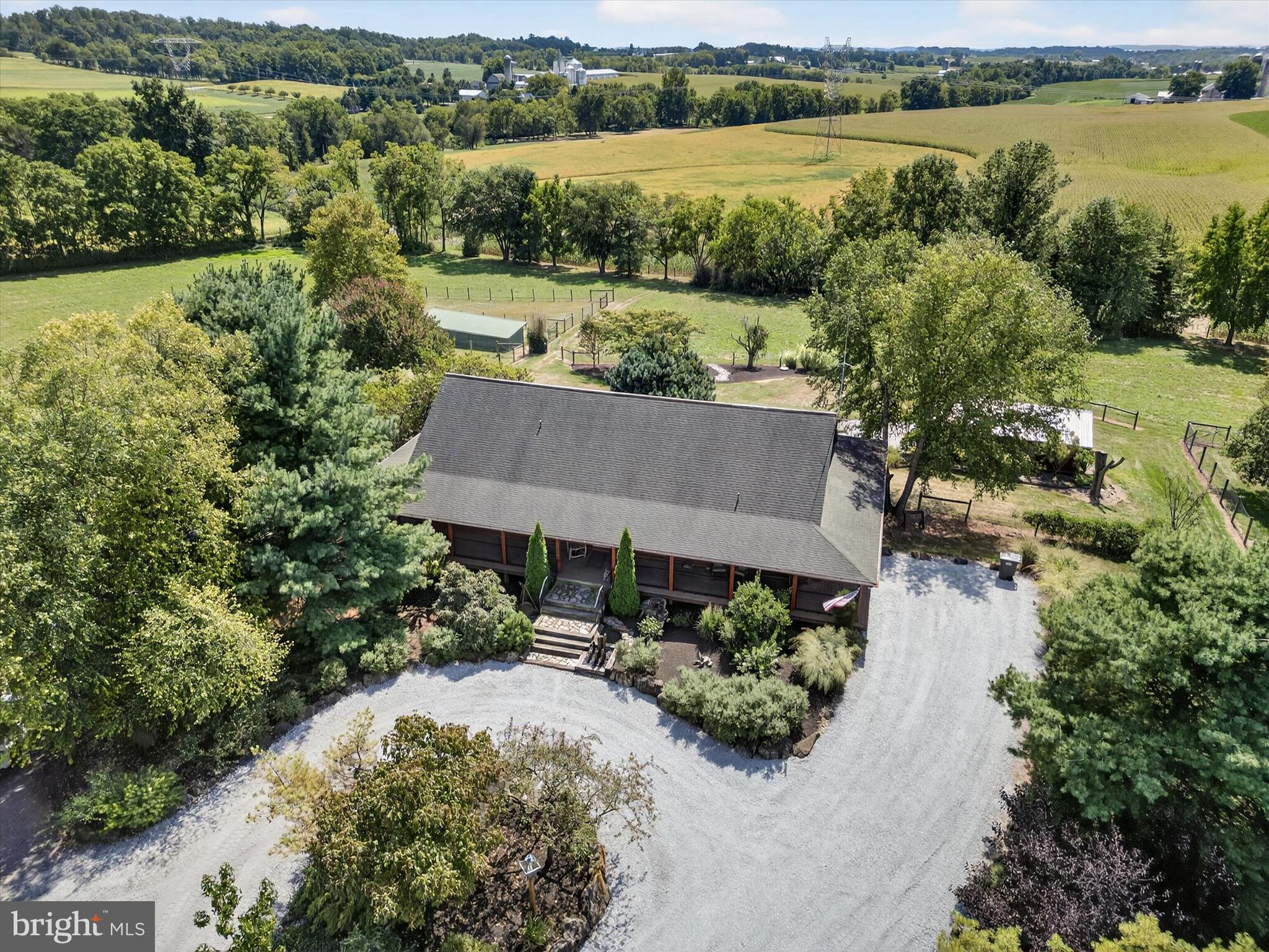 975 Cold Springs Road Elizabethtown, PA 17022 - Photo 1 of 56 an aerial view of a house with a garden and lake view