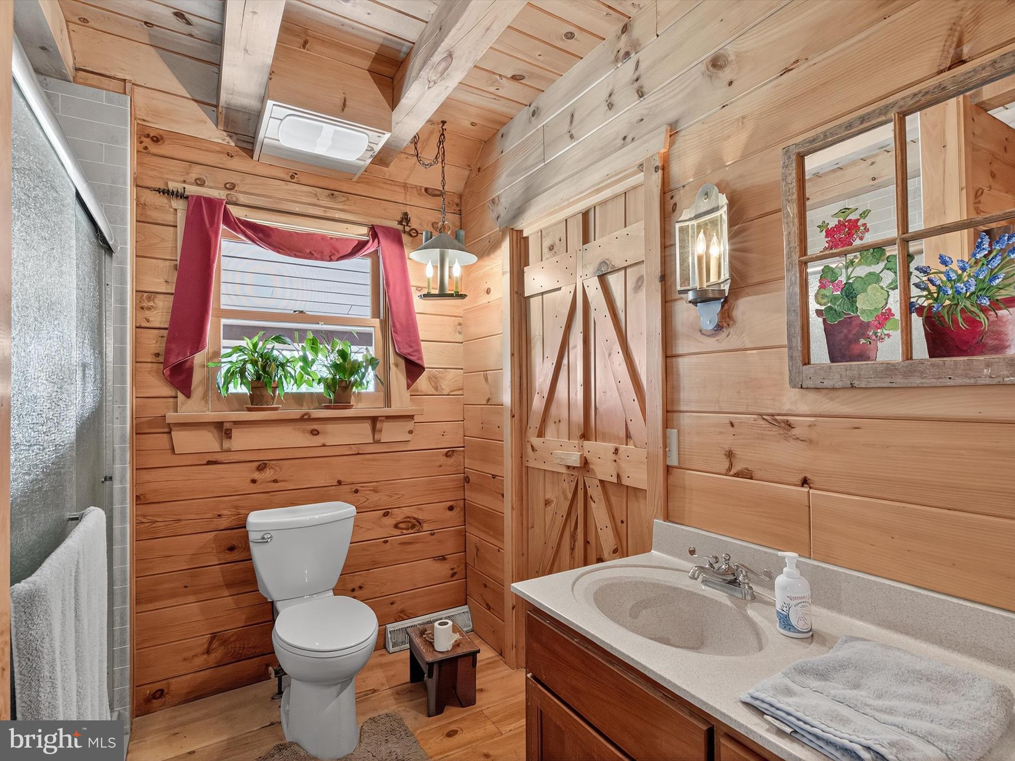975 Cold Springs Road Elizabethtown, PA 17022 - Photo 24 of 56 a bathroom with a sink toilet a mirror and tub