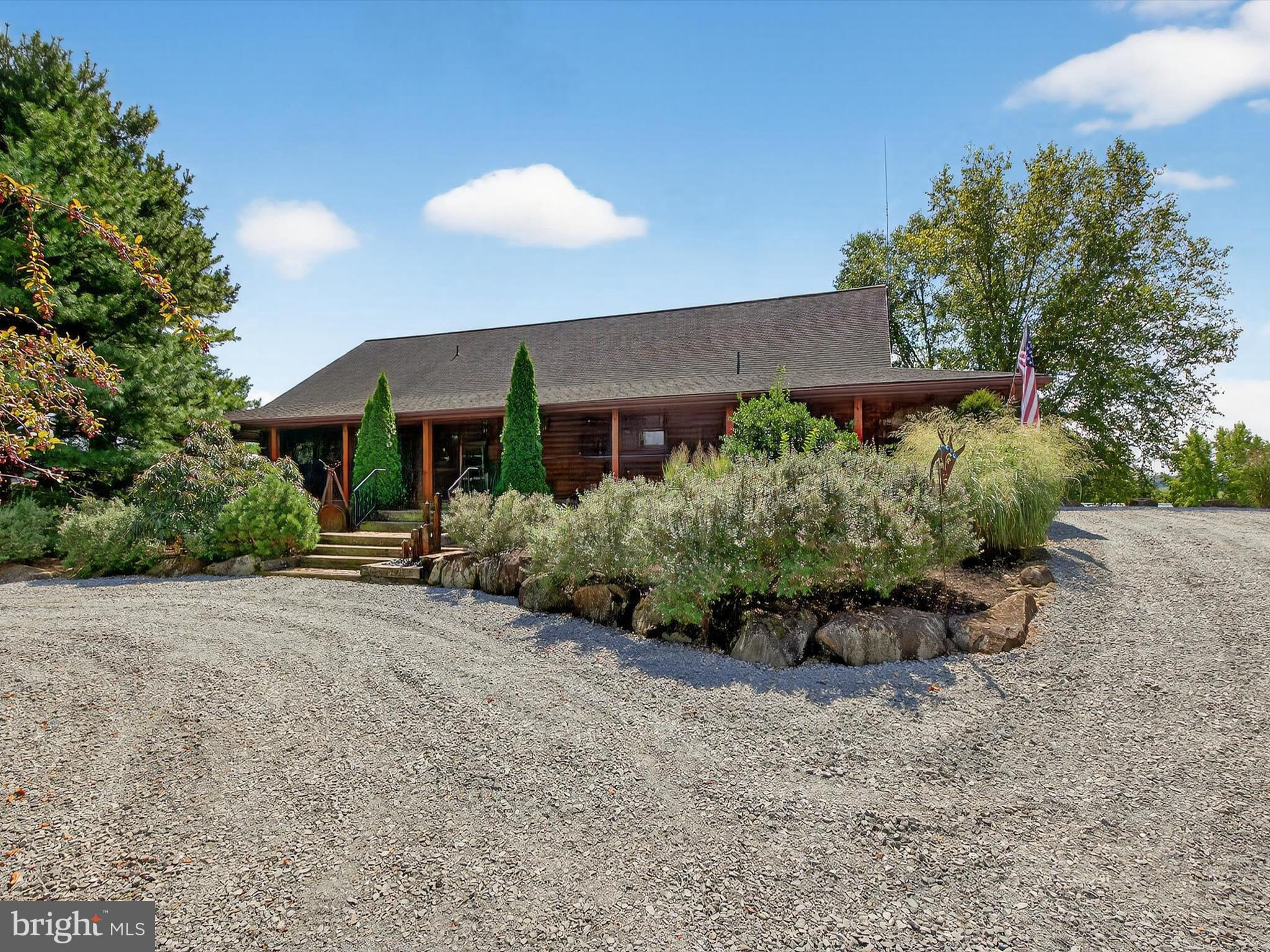 975 Cold Springs Road Elizabethtown, PA 17022 - Photo 4 of 56 a front view of a house with a yard