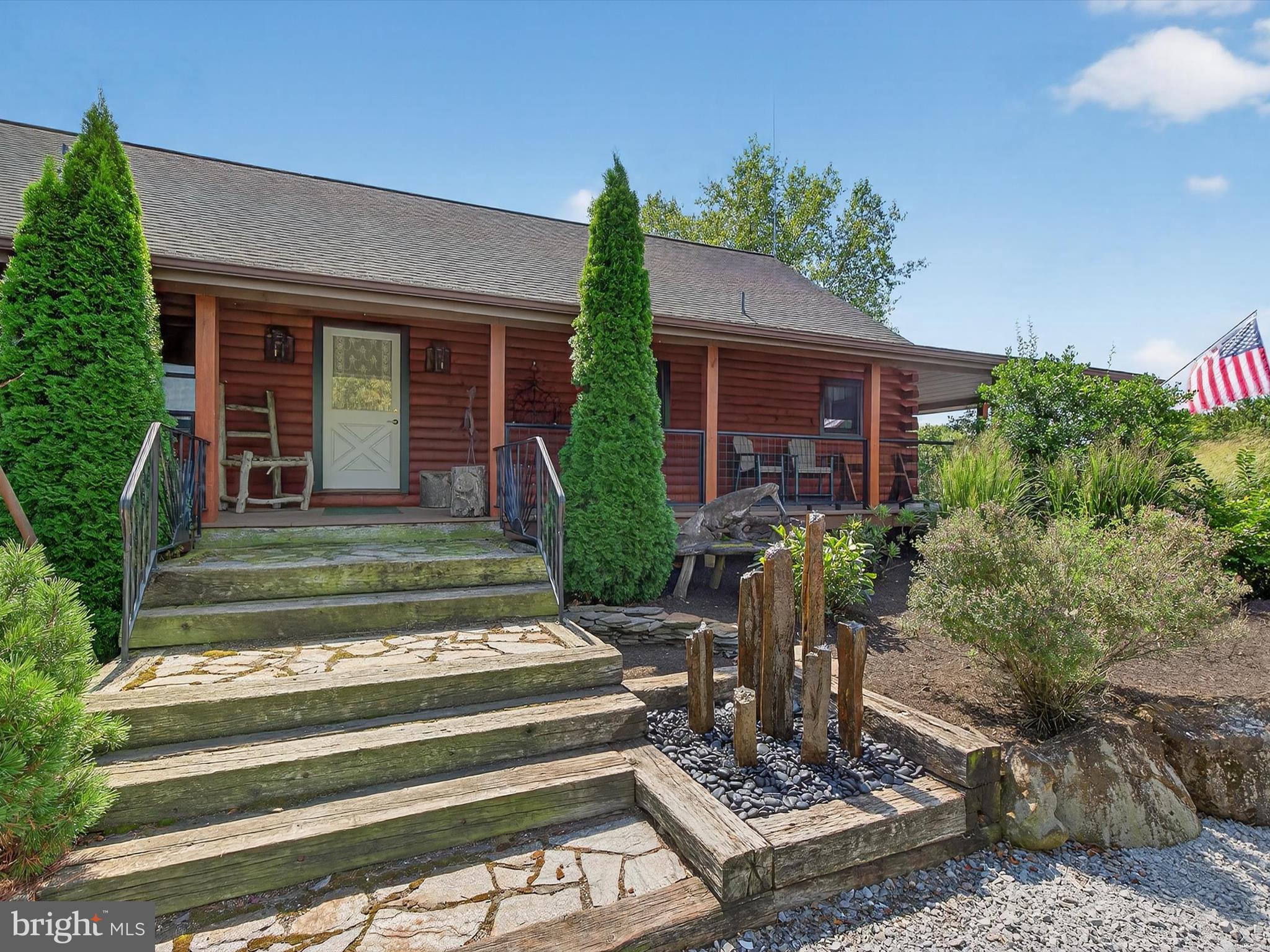 975 Cold Springs Road Elizabethtown, PA 17022 - Photo 9 of 56 a front view of a house with garden