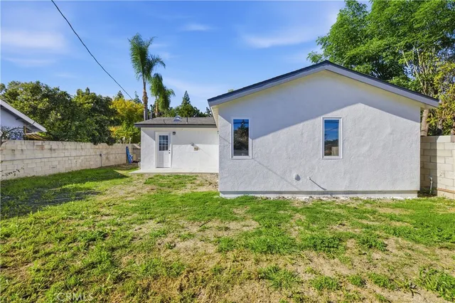 a house view with a garden space