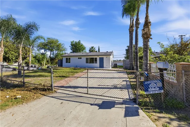 front view of a house with a street