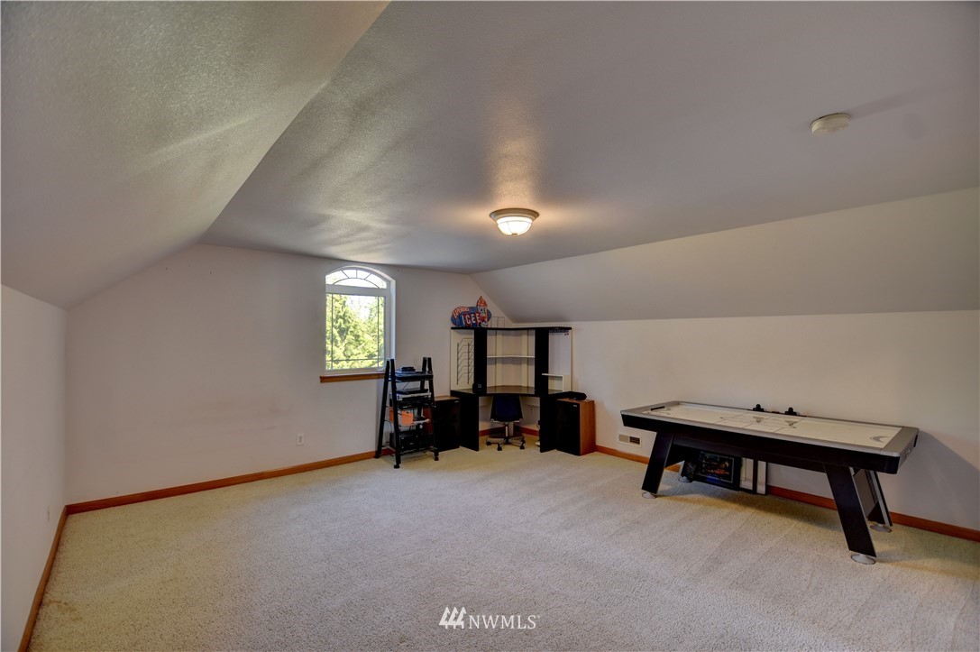 15837 Case Road Southwest Rochester, WA 98579 - Photo 22 of 40 a view of a livingroom with furniture and window