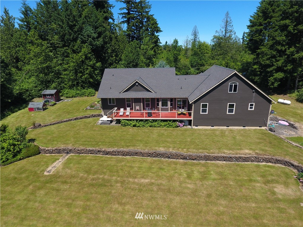 15837 Case Road Southwest Rochester, WA 98579 - Photo 26 of 40 a front view of a house with a garden