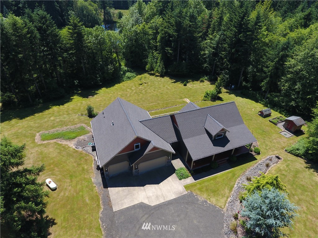15837 Case Road Southwest Rochester, WA 98579 - Photo 38 of 40 an aerial view of a house with yard swimming pool and outdoor seating